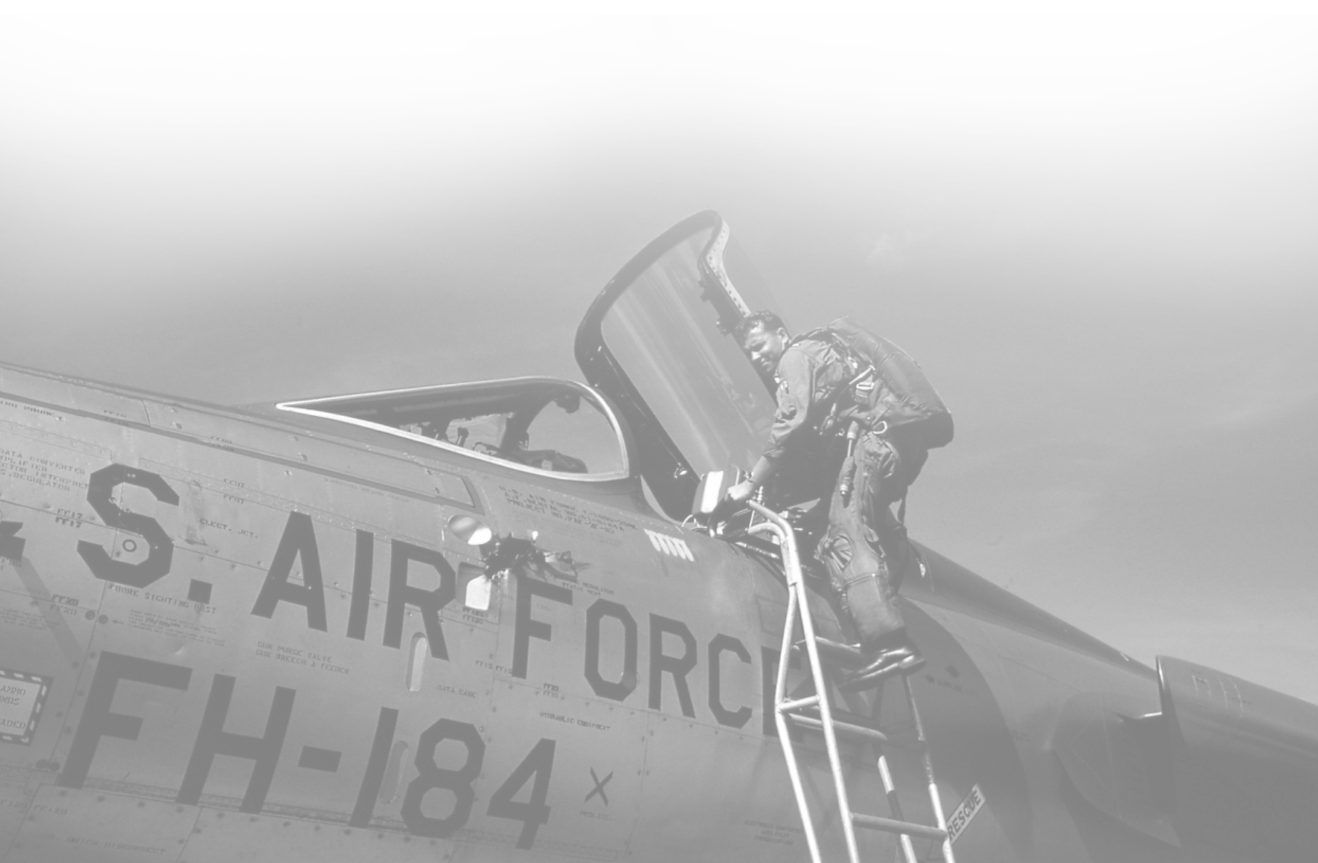 archival photo airman climbing in to cockpit